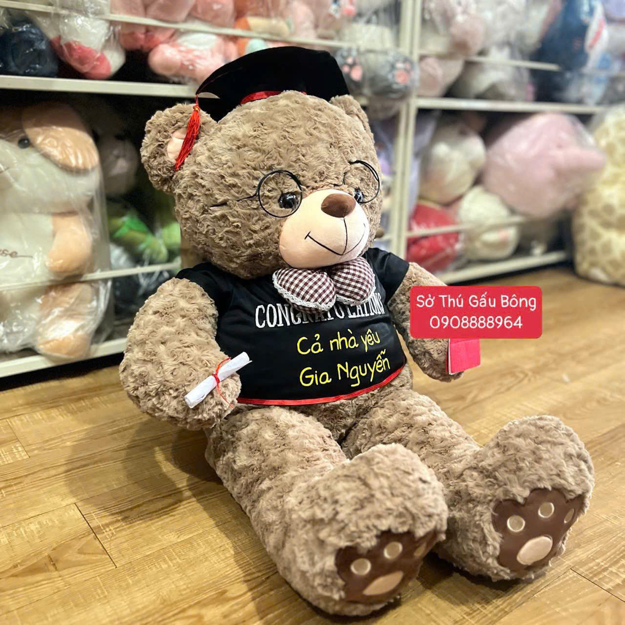 Gấu Tốt Nghiệp - Gấu Ngực Tay Love Nơ Caro