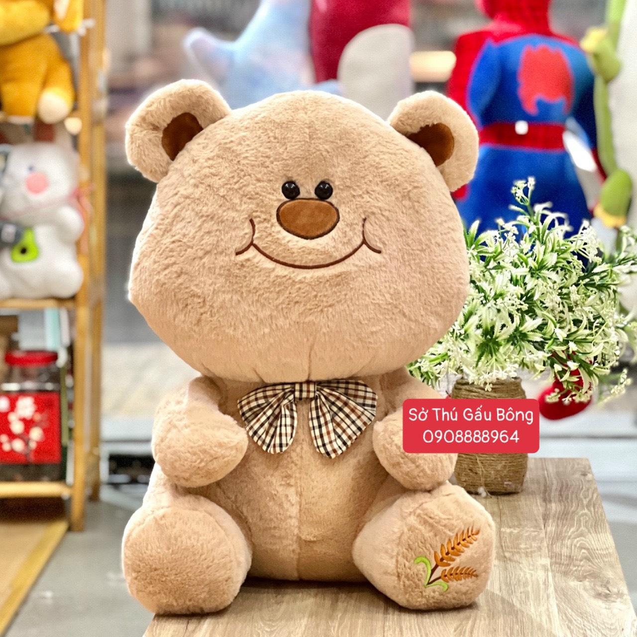 Gấu Bông Nơ Chân Thêu Lá