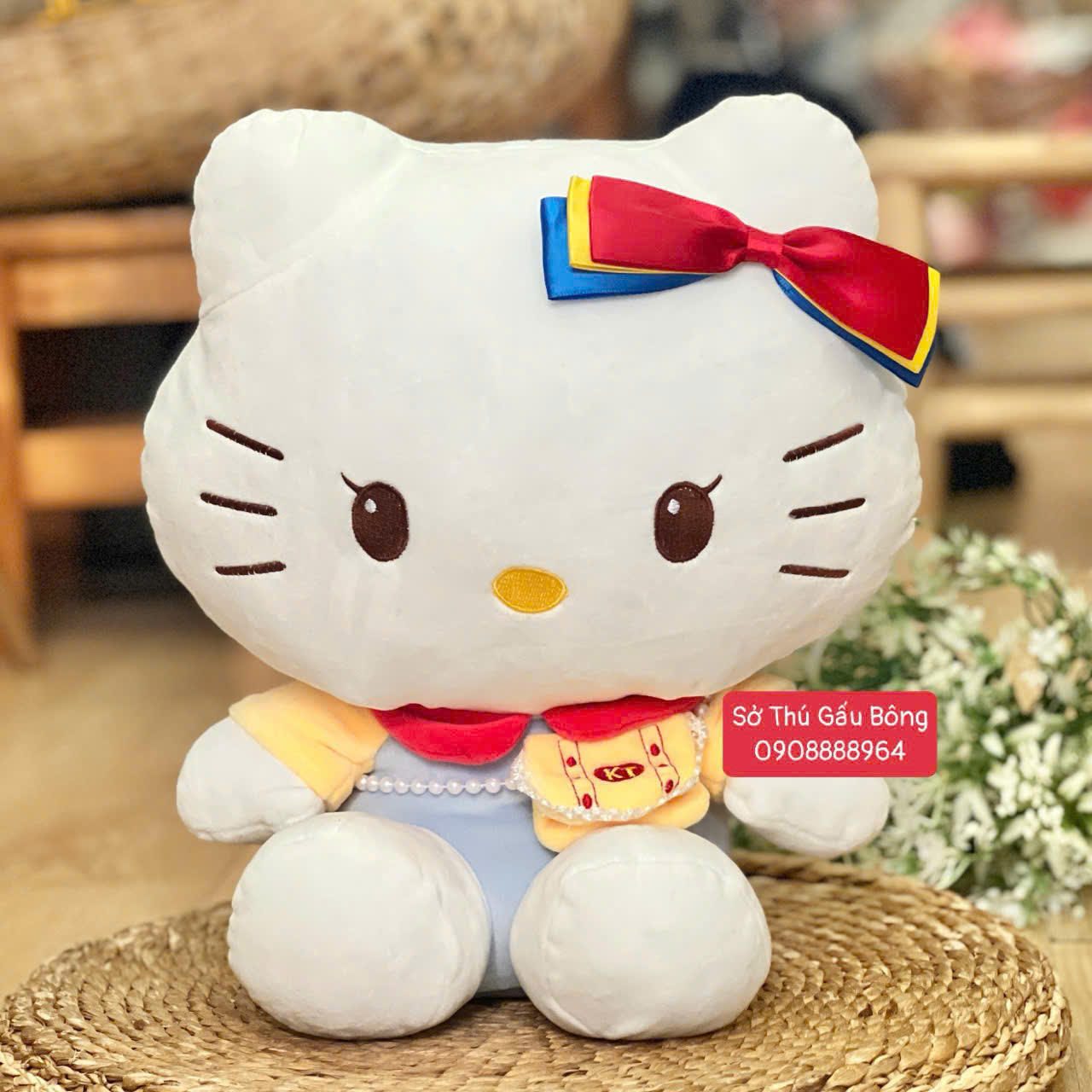Mèo Kitty Đeo Túi Ngọc Trai